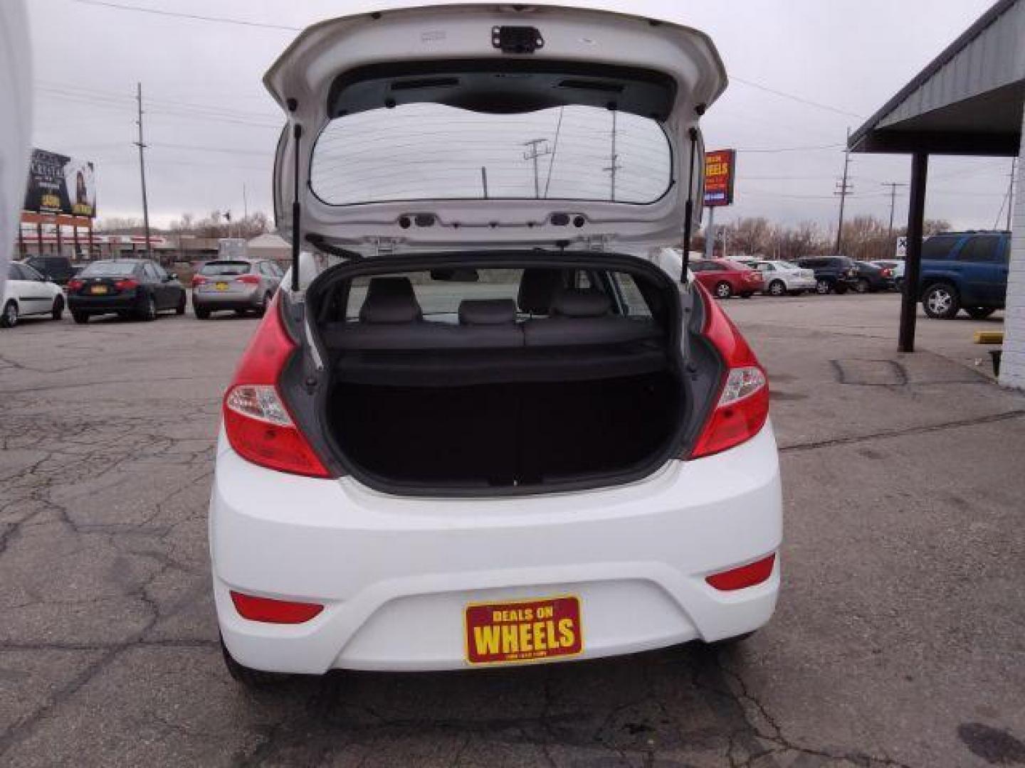 2016 Hyundai Accent SE 5-Door 6A (KMHCT5AE0GU) with an 1.6L L4 DOHC 16V engine, 6-Speed Automatic transmission, located at 4047 Montana Ave., Billings, MT, 59101, 45.770847, -108.529800 - Photo#6